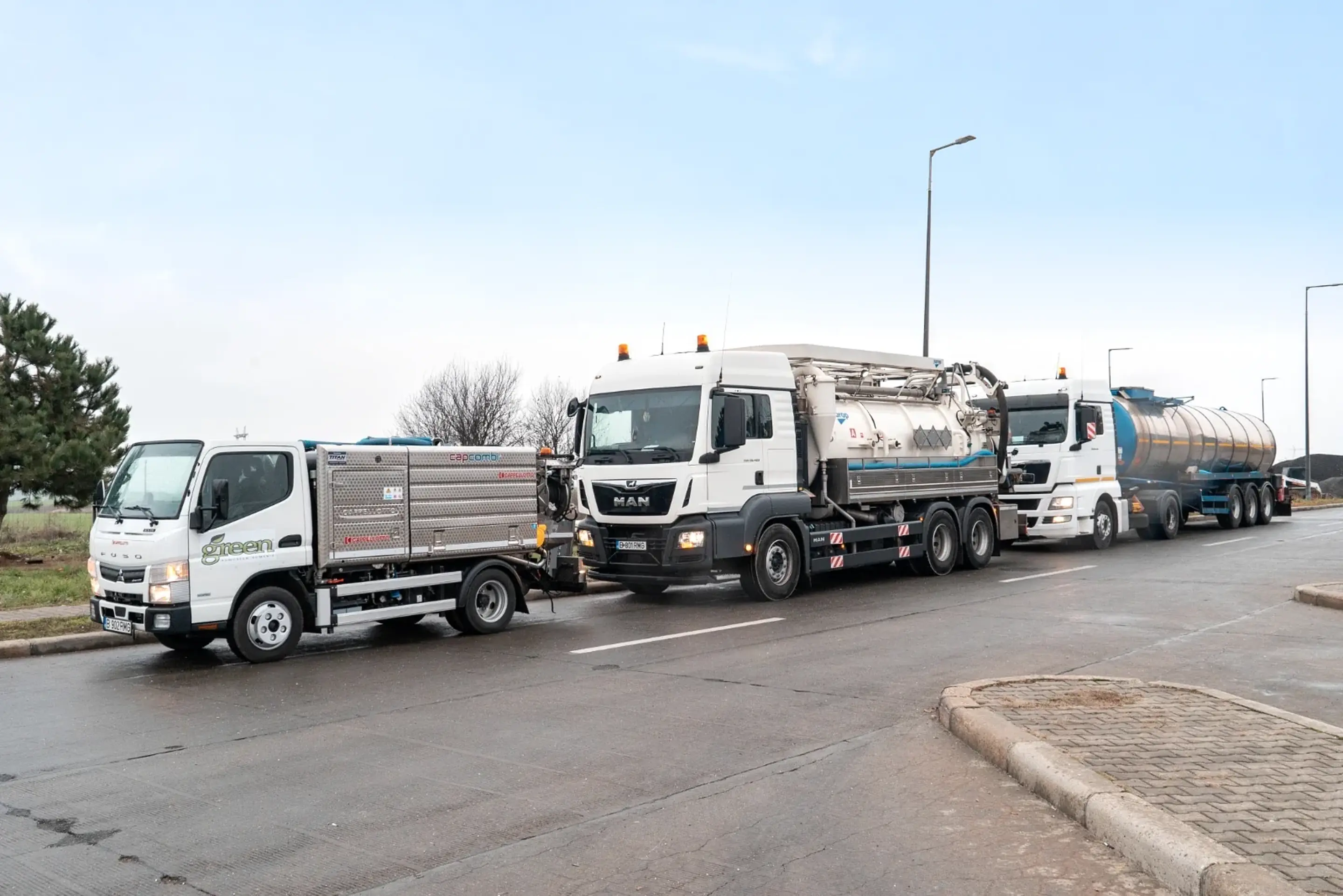 Romgreen's own fleet of vacuum tankers parked side by side